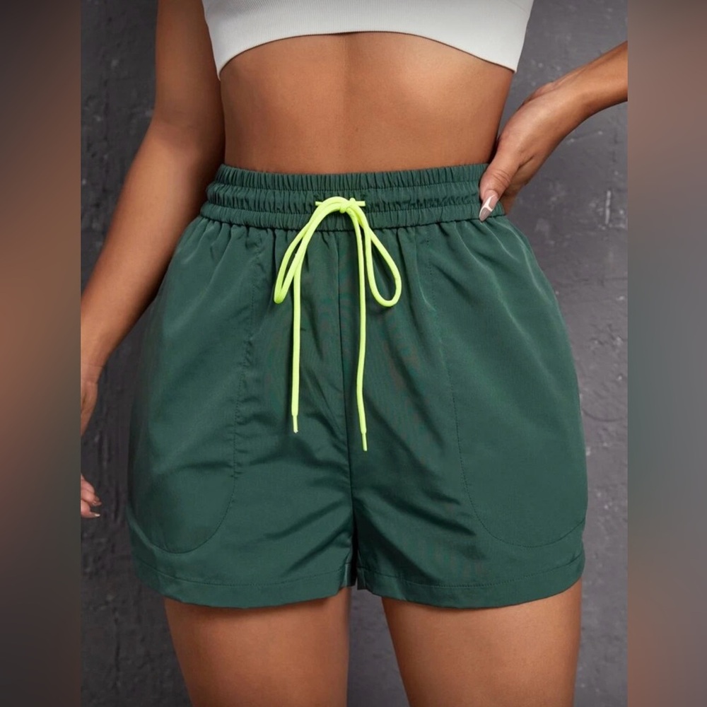 Green Sporty Shorts with Neon Accents